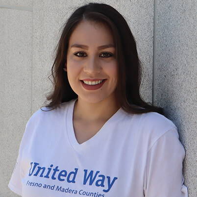 Portrait of Ashley Ruiz, wearing a United Way Fresno and Madera Counties shirt